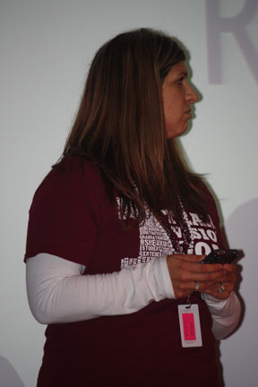 Seventh grade English teacher Lindsay Zerbee pretends to text on her phone in the bathroom, showing a bad example of respect at the ROAR assembly in the auditorium on Sept. 21, 2012. The assembly was one of the first PBS sponsored activities to help show students how to earn lion loot and be respectful to the school and others at the same time.  Photo by Ashton Leberfinger