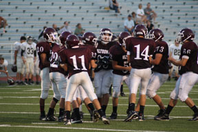 Altoonas offense lines up in the huddle to get the play.  Altoona ran many different plays against State College.