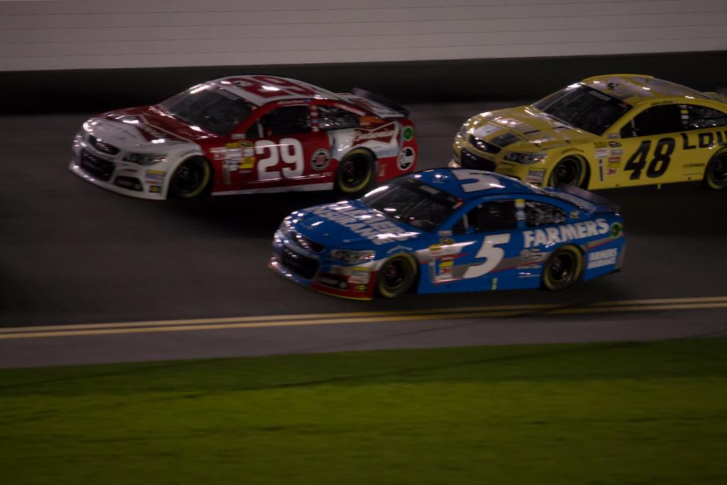 Kevin Harvick, Kasey Kahne, and Jimmie Johnson racing before lap 15.
Photo Courtesy of Steven Miller