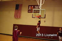 Elijah Gage shoots a lay up in warm ups before a game against Hollidaysburg.