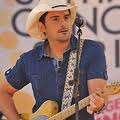 Brad Paisley sings on the stage for his fans. Courtesy of http://www.flickr.com/photos/asterix611/5942013970/