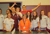 Ms. Donlan and Mr. Nezneski stand with ninth graders (left to right) Jimmy Luciano, Sarah Donley, Will Dixon, Jacob Port, Claudia Devorris, Kersti Cover, Lydia Greaser, Taylor Stoudnour. Photo by Tyler McCloskey.