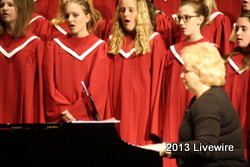 The piano player Pam plays the piano for the seventh graders. Photo by Tyler McCloskey