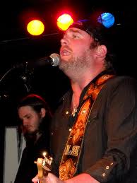 Lee Brice singing to his fans. Courtesy of http://www.flickr.com/photos/denisemattox/4625212903/ 