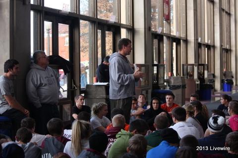 Indoor Track coach, Mike Adams, talks to the team about the meets that are coming up. Photo by Hannah Barr