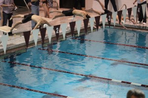 Indoor swim brings home win and loss