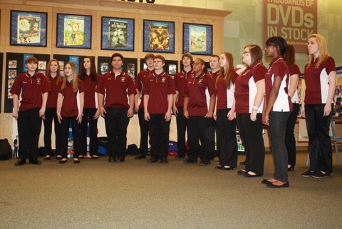 Deck the Halls! Vocal Ensemble performs at the Barnes and Noble Book Fair. After the Vocal Ensemble performed, the Chamber and Orchestra performed. Photo by Hannah Barr