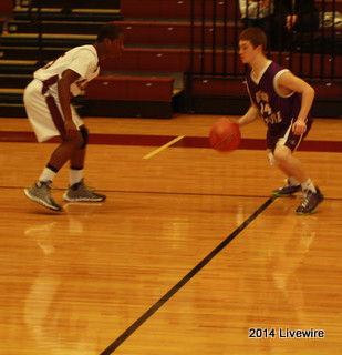 Ninth grader, Steve Franklin, plays defense. He was defending the ball so that the opposing team did not score. 
Photo by Hanna Feathers
