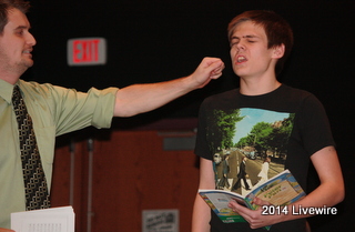 Ninth grade teacher and play director, Johnathan Klingeman, and ninth grader, Michael Bruce practice for the upcoming play, Peter Pan Jr. Bruce was portraying the part of Captain Hook. The cast practice almost everyday so that they can memorize their lines and songs.
Photo By: Hanna Feathers