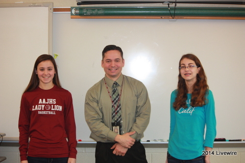 Working Students!  Two students, Maura Skelley and Andrea Scott, with their teacher Andrew Danish in American Culture.  These were the winners of the writing contest he entered them in.  