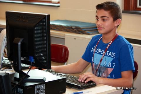 Ninth grader, Aaron Colbert, practices typing on the computer. Since the yearbook is done and being printed, the yearbook class practiced typing. Photo by Hannah Barr