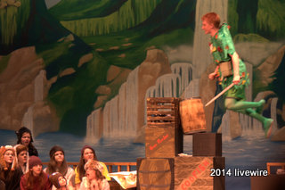 Ninth grader Trent Miller flies over the stage during one of the final scenes of the play. Miller played the role of Peter Pan.
Photo by- Joanne Pringle