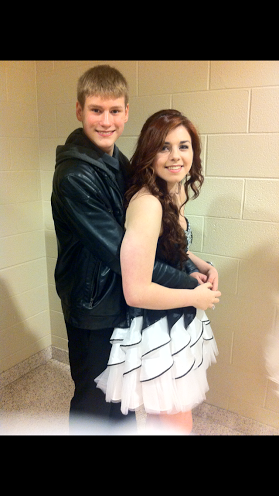 Smile! Abigail Randolph and her date, Lance Langensiepen take a picture in their dance clothes. Picture courtesy of Abigail Randolph.