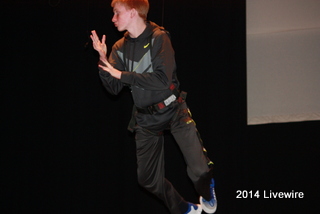 Trent Miller is learning how to fly for the school play Peter Pan. This is their first flying practice and its going to take some getting used to.
Photo by Becca Gallace