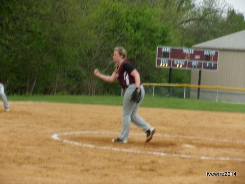 Varsity softball plays State College at Logan Elementary. Ninth grader Alexa Young pitches for the team throughout three innings. 