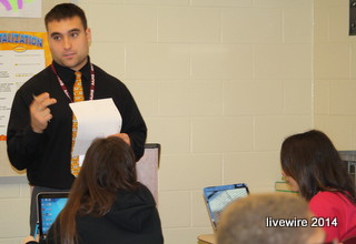 Mr. Porter is teaching his students  English skills on the computer.  This isfirst year being a certified teacher.    The students are the number one priority, Porter said.  Photo by Faith Bonghi