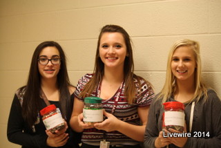 In this photograph is member of the ninth grade committee, Halle Miller, Shianne Graham, and Madisyn McMulin.