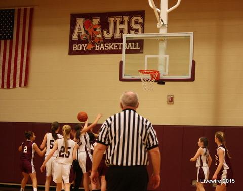 Seventh grade girls basketball team at their game