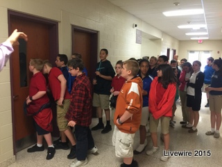 Students peek into In School Suspension (ISS) room.