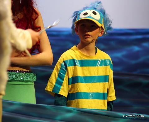 Ethan Katcher who played flounder was swimming through the sea with Ariel 

Photo taken by Emily Simmons