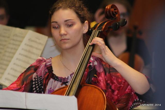 Iris+Raschbacher%2C+an+Austrian+student%2C+performs+a+solo+on+her+cello+at+the+Sister+City+banquet.++Rasbacher+played+with+her+American+host+student%2C+Ariel+Walton%2C+who+is+also+a+proud+musician.+