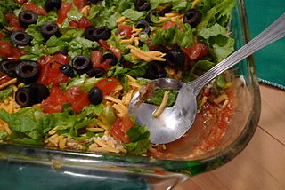 By lauren (Flickr: super bowl eats (7 layer dip)) [CC BY 2.0 (http://creativecommons.org/licenses/by/2.0)], via Wikimedia Commons