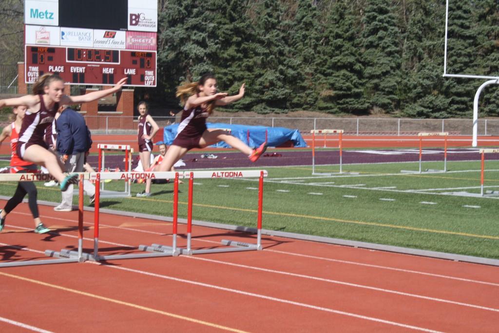 Maura Skelley is a hurdler o  this years team. Here is her competing against the Bellefont girls at the track meet

Photo taken by Mikayla Billotte