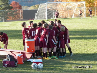 After their last game, everyone comes together to celebrate.