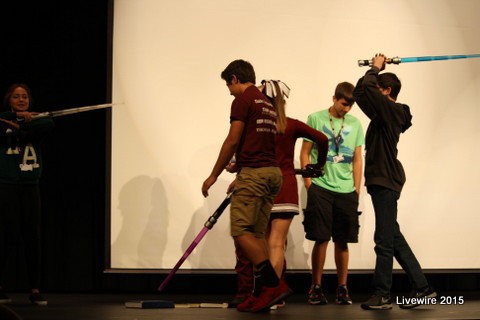 Light saber in hand, Owen Kravetz performs on the stage at the PBS Kick Off Assembly on October 2nd. Owen fought his fellow classmates in a battle to win the best skit. On the stage, he shows a expression of defeat as he walked off stage during his class skit. 