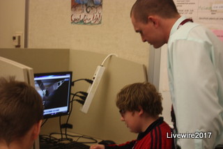 Doing school work:  In school suspension teacher Cameron Kyle helped a student do work on the desk top.  Kyle is one of the replacement teachers that are fulfilling their duties. 