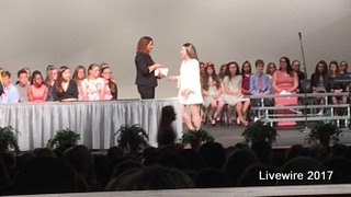 Awards! Seventh grader Elly Eisel going to collect an award from a seventh grade teacher.