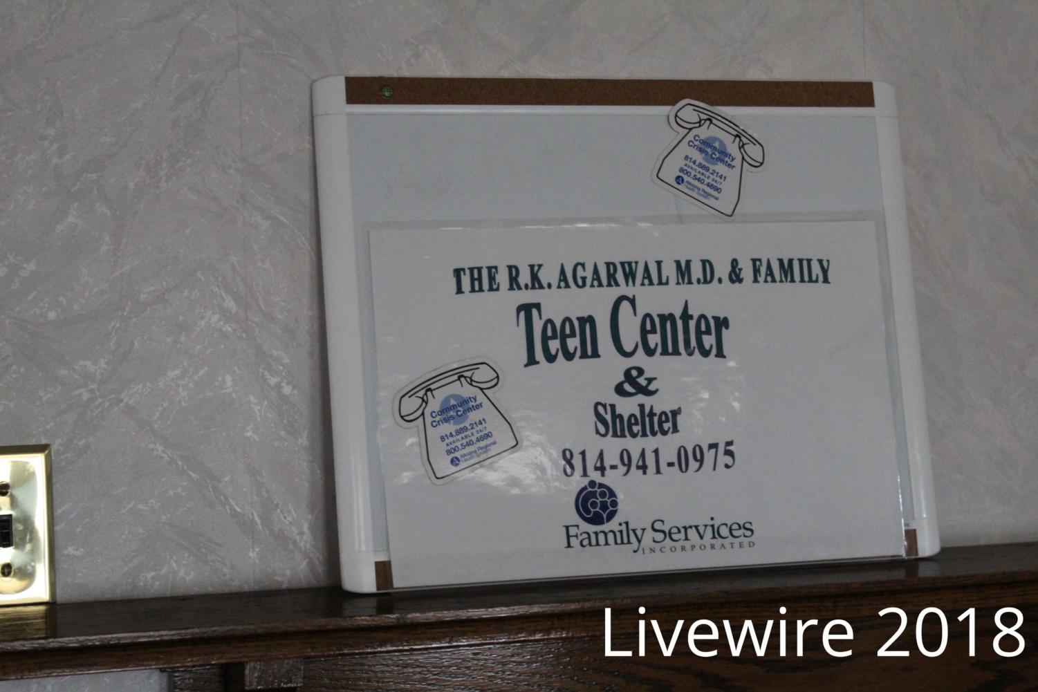 Shelter. The teen shelter sign is hung up in various places around the building. The shelter was built a little over a year ago.