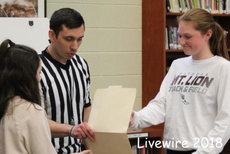 Students compete in rock, paper, scissor competition