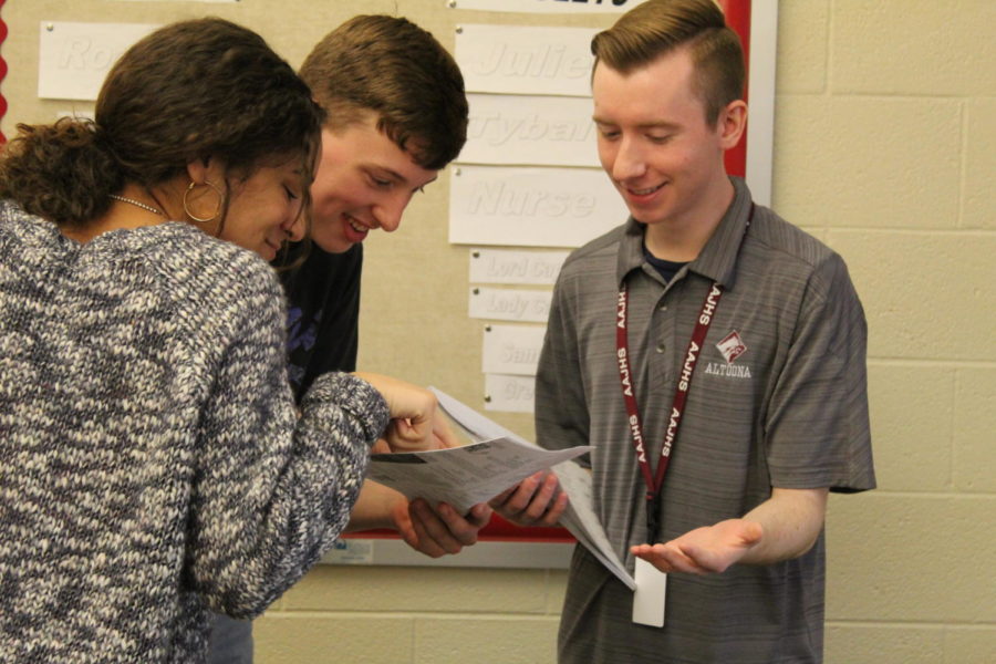 Connor Chywski, a new addition to the staff for the 2017-2018 school year, teaching two of his ninth grade English students, Eryka Moss and Nick Santone.