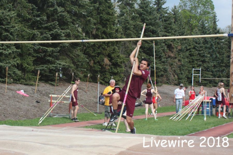 Jump! Jace Ebersol vaults on May ninth. Ebersol was part of the few ninth grade pole vaults.