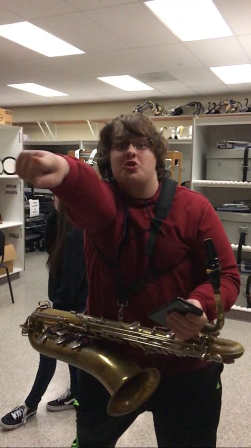 Hey, you!
In the band room, Aiden Phillips brings out his wild side as he prepares for jazz band practice.
