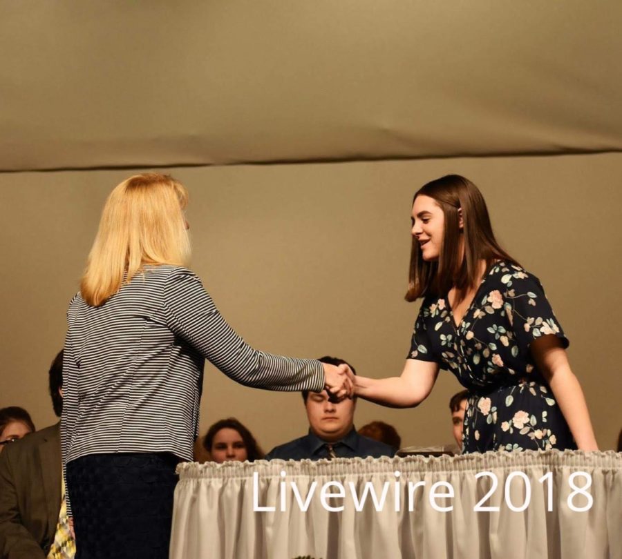Thank you. Gionna Civarella shakes Lori Mangans hand at the ninth grade awards ceremony on May 2. Civarella shook her hand and then sat back down.