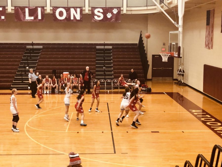 Swoosh%0ANinth+grade+point+guard+Gracie+Wilt+takes+a+foul+shot+to+raise+their+score+against+Cumberland+Valley.+The+game+against+Cumberland+Valley+was+a+loss+for+the+girls%2C+but+they+played+against+them+with+full+power+until+the+end.