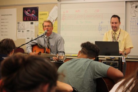 Let's play!
Kent Martin teaches his class how to play the 12 bar blues. The introduction to guitar class was only a marking period, but soon this, and many other marking period classes, will be a full semester long.