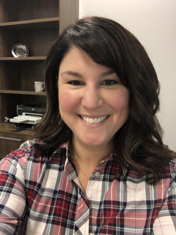Keri Harrington smiles brightly for her photo. Years after earning her principalship, she makes the change in her life and becomes an assistant principal.