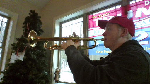 Playing position. Eighth grader, Randy Grove, played the trumpet on Dec. 1, 2020. His playing was part of his audition for this year's AAJHS jazz band. "I felt nervous with a sense of accomplishment," he said.