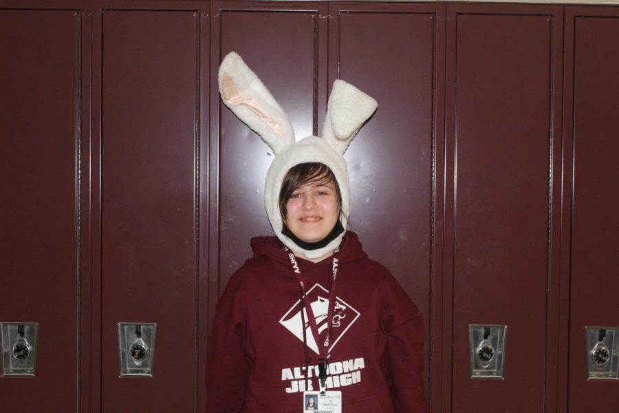 People was wearing hats for a program called PBIS and I met a girl in the hall way wearing a funny bunny ear hat!