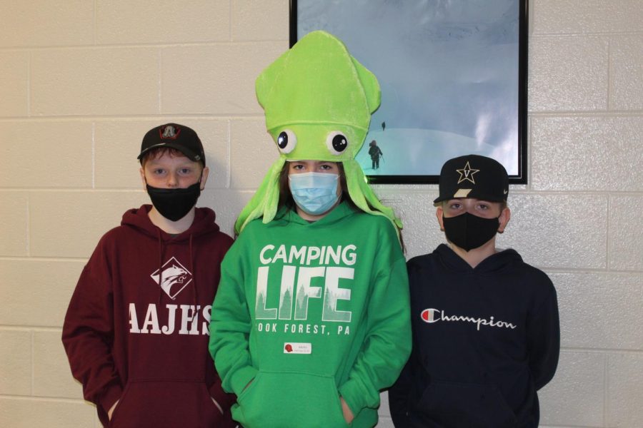 A group of kids from sixth grade had fun taking this picture even the squid hat was funny it glowed up!