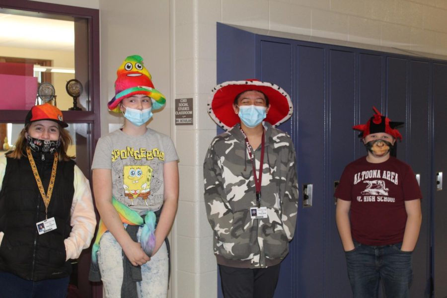 This is one of my favorite pictures its funny  one kid in six grade wore a conga hat and the other wore a poop hat!