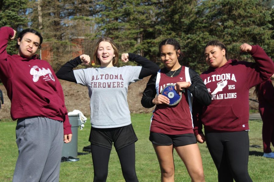 Strike+a+pose.+Eighth+graders+Kihlee+Noel%2C+Mylin+Betz%2C+Zae+Nguyen-Moore+and+Amari+Triplin+compete+together+again.+The+girls+were+throwing+the+discus+held+by+Nguyen-Moore.+
