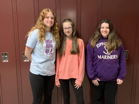 Pastel pose! Eighth graders Megan Kelly, Madyline Blontz and Autumn Baker smile for a photo on Thursday, April 14. Students were encouraged to wear pastel colors to welcome spring.