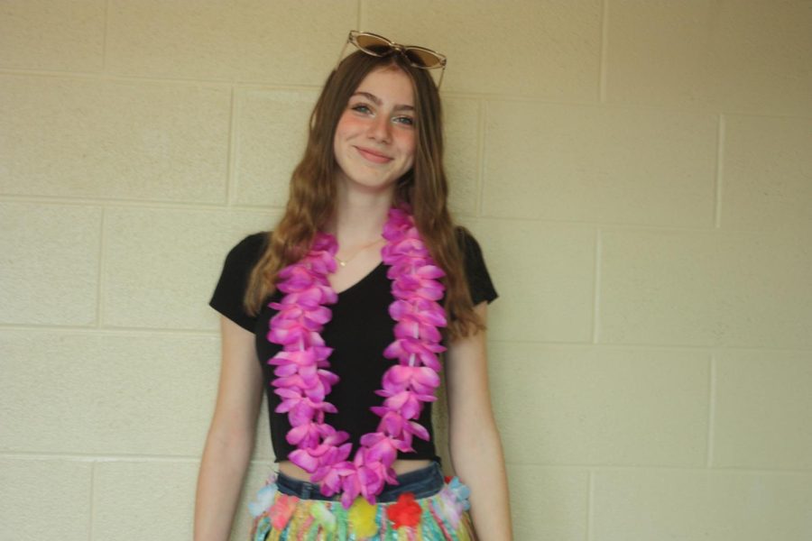 Hula skirt and  glasses. Seventh grader Emma Glunt is ready for summer. She wants summer to come and never end.