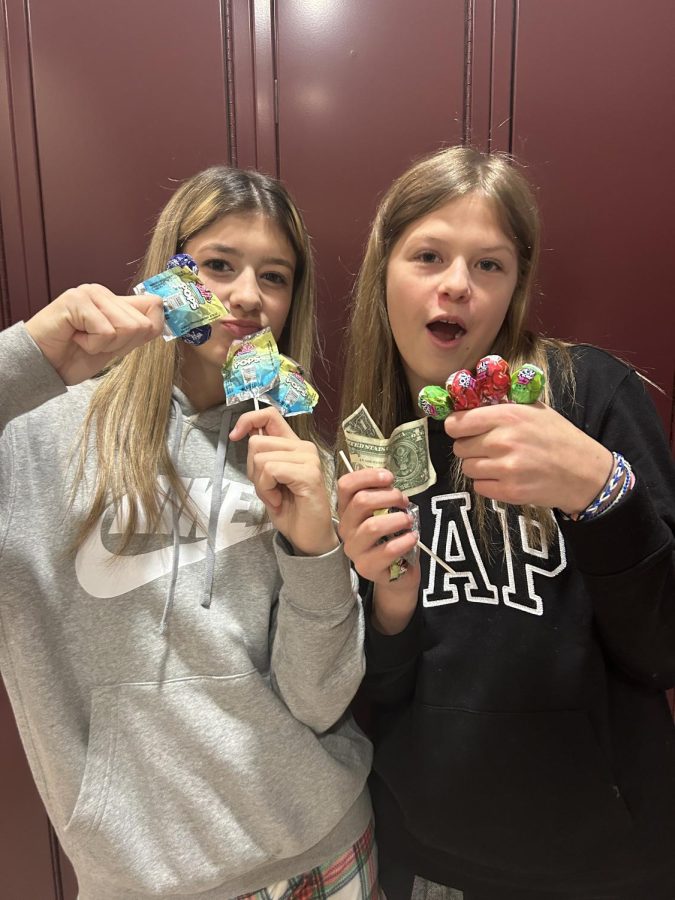 Lucky! Eighth grade students Madison Mirabella and Brianna Bougher are big supporters.   Mirabella and her partner in crime were two of the first to join the sale, which gave them a great advantage to pick their favorite flavors.