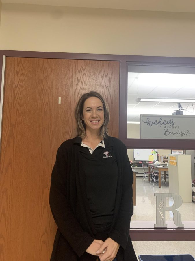 Snapshot! Sixth grade reading specialist Annie Rupp poses for her photo. She had a prep period prior to the interview, planning as much as she could for her classes.
