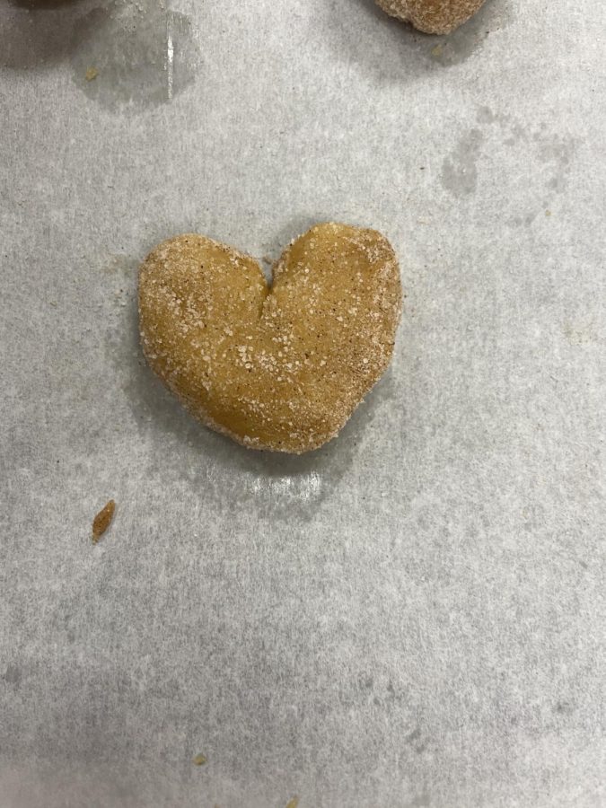 Yum! These Pumpkin Snickerdoodles were made with love. The eighth graders in Brandy Juarts sixth period class made cookies, and one in a heart shape! These are looking good! said eighth grader Emma Glunt.